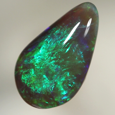 SOLID BLACK OPAL Bright golden green and purple blue